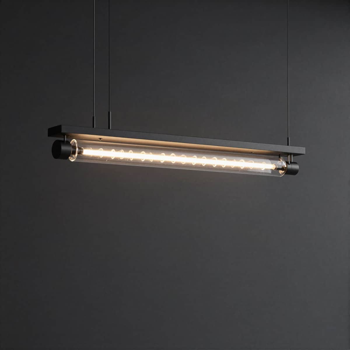 Modern linear pendant with a warm LED filament tube